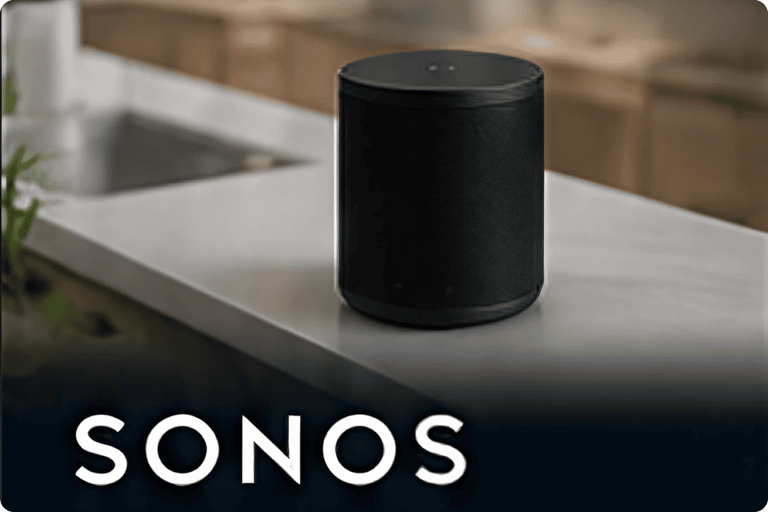 Black Sonos smart speaker on kitchen countertop